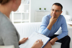 man in office gets individual therapy